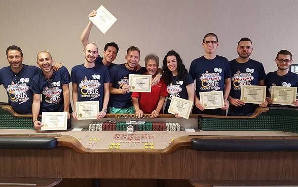 Congratulations to our students from the Cerus Casino Academy who are posing here with their diplomas and CGS Owner Nick Kallos (in center with red shirt)