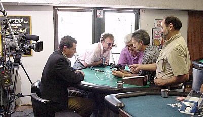 The ABC News reporter, cameramen and technician discuss the best way to capture Nick's chip handling segment.